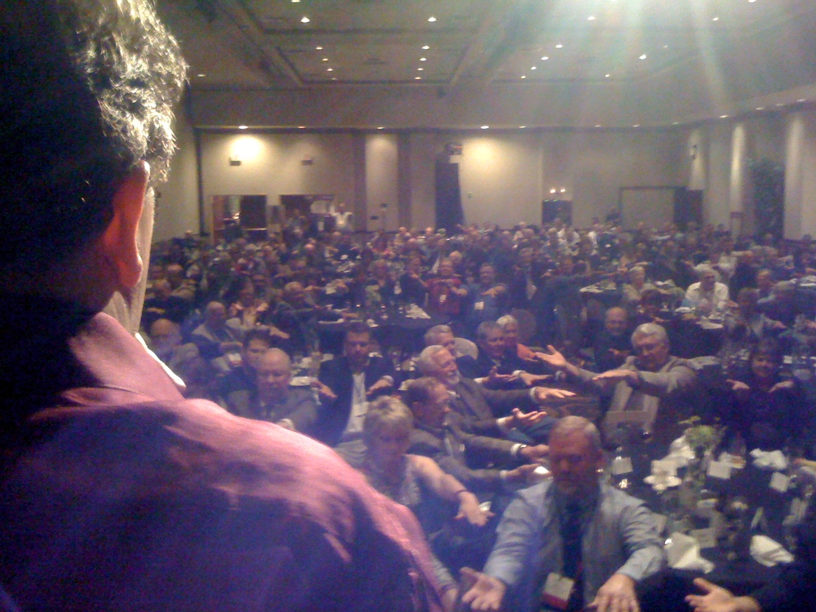 hypnosis show audience is getting hypnotized by hypnotist chris cady view from the stage at the silver legacy hotel